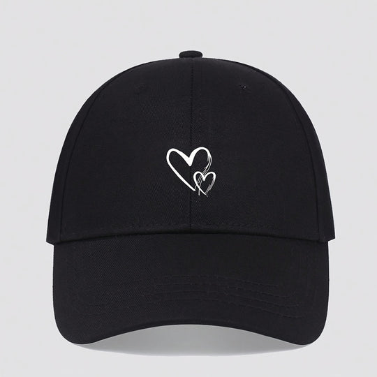 Naomi - Adjustable Baseball Cap with Heart Print and Breathable Design